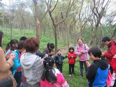 Parents and children taking part in Affective Nature Education activities run by partner in Guangxi.